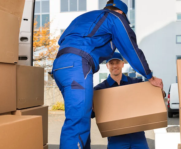 Professional movers handling boxes for affordable moving service in Elkhart, IN.