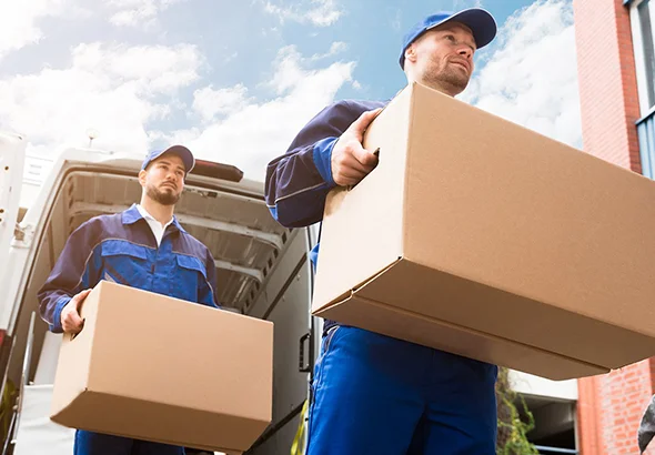 Movers Carefully Loading Boxes, Representing Benefits of Moving Labor Service in Elkhart, IN.
