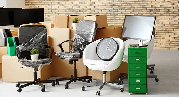 Office chairs and equipment being moved for office furniture moving service in Notre Dame, IN.